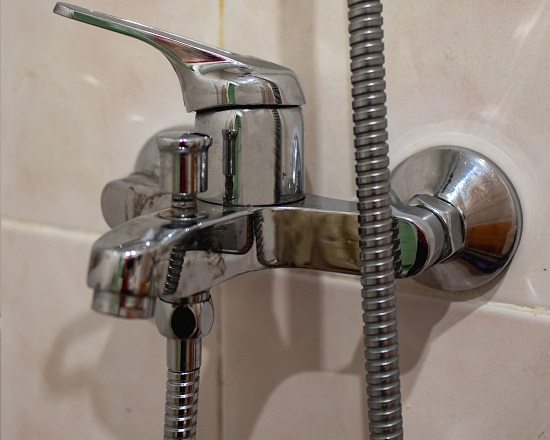 After our alley odd jobs cleaning service on this clients faucet and bathroom